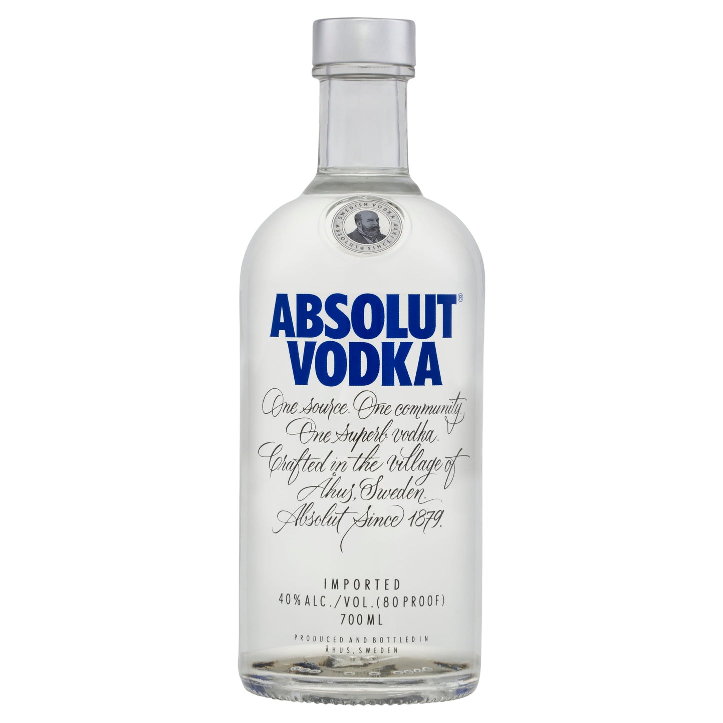 A clear glass bottle of Absolut Vodka with a label that includes the brand name and the text 'Absolut Vodka, One source. One community.