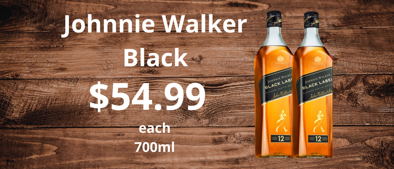 Two bottles of Johnnie Walker Black Label whisky on a wooden background with pricing information.
