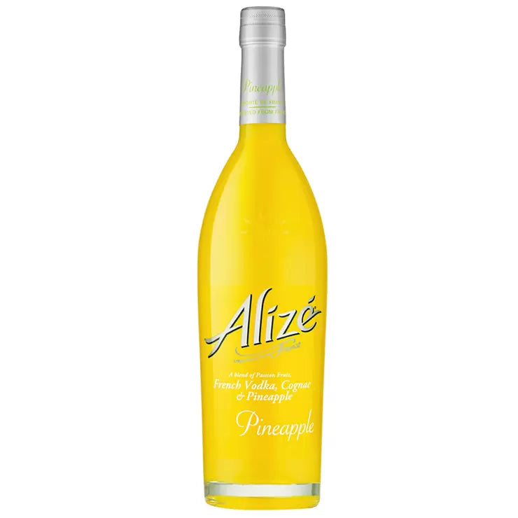 Yellow bottle of Alize Pineapple liqueur on a white background