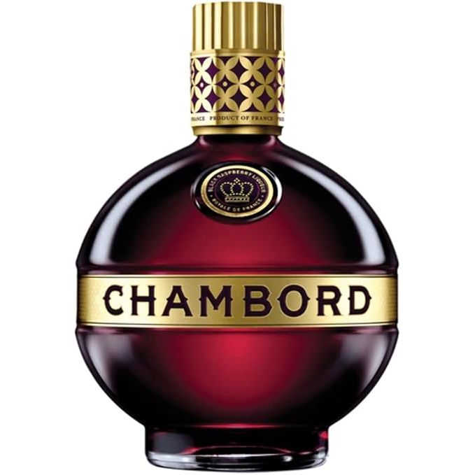 Chambord cognac liqueur bottle with deep red liquid, a gold band with black lettering, and a gold cap on a white background.