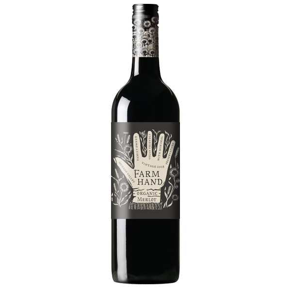 Bottle of Farm Hand Organic Merlot wine on a white background