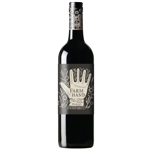 Bottle of Farm Hand Organic Merlot wine on a white background