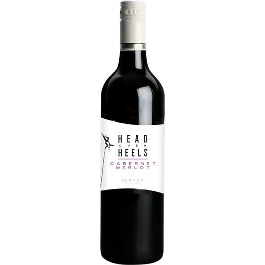 Red wine bottle with 'Head Over Heels' label on a white background