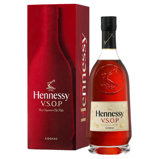 Hennessy V.S.O.P cognac bottle and red box on a white background