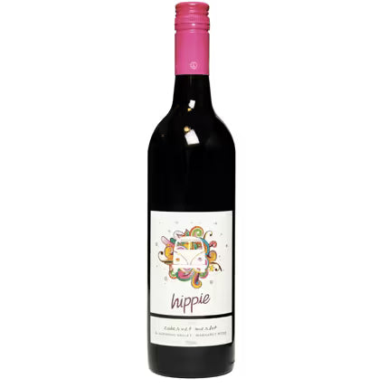 Wine bottle with a colorful label featuring a cat illustration and the word 'hippie'.
