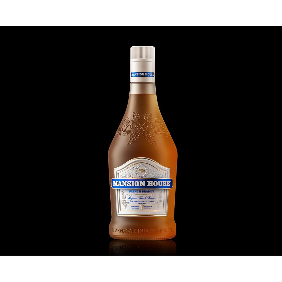 Bottle of Mansion House brandy on a black background