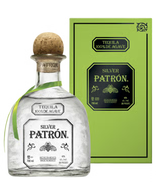 Silver Patron tequila bottle with cork stopper and green box on a light green background