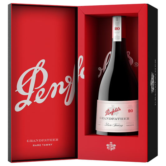 A bottle of Penfold's Grandfather Rare Tawny Port Wine presented inside an open red gift box with a red interior and black outer sides. The bottle label is white and pink, and the box features the Penfold's branding in white script.