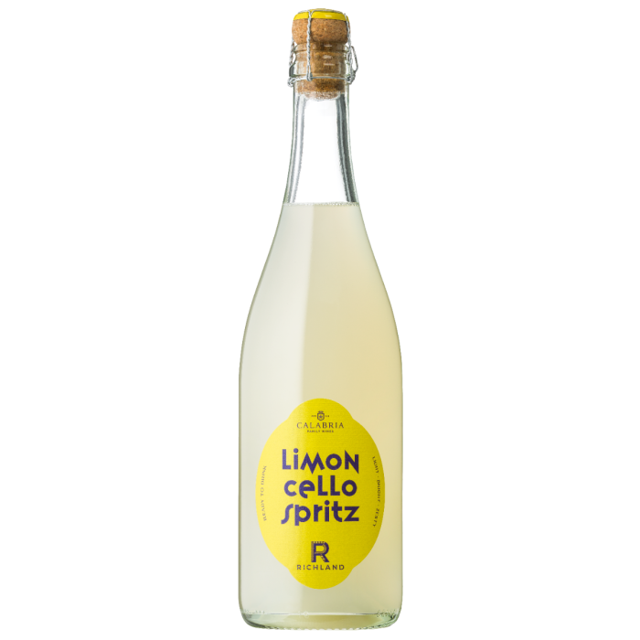 Bottle of Limoncello Spritz with a yellow label on a white background