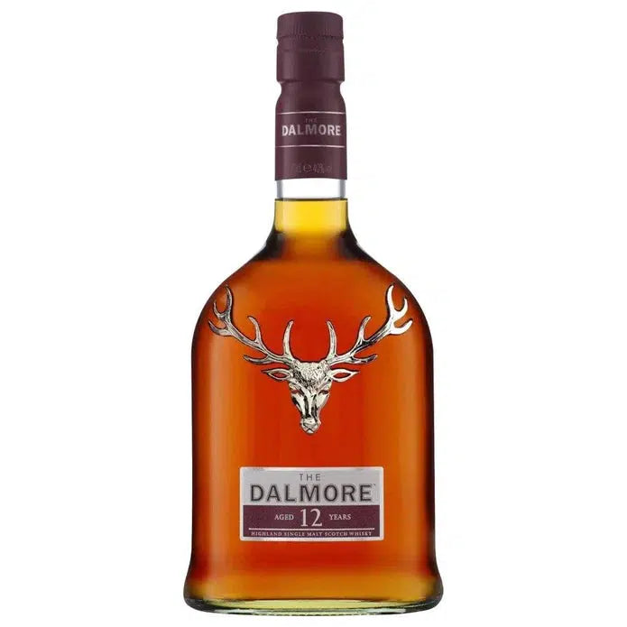 Bottle of Dalmore whisky with a stag logo on a white background