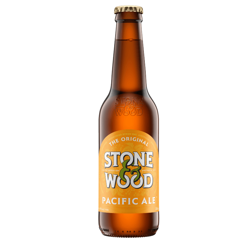 A bottle of Stone & Wood Pacific Ale with a label that has orange, yellow, and green colors and text.